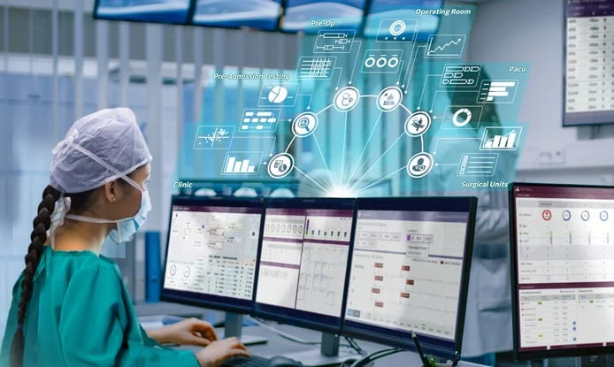 Image of a provider looking at data served by GE HealthCare Command Center.